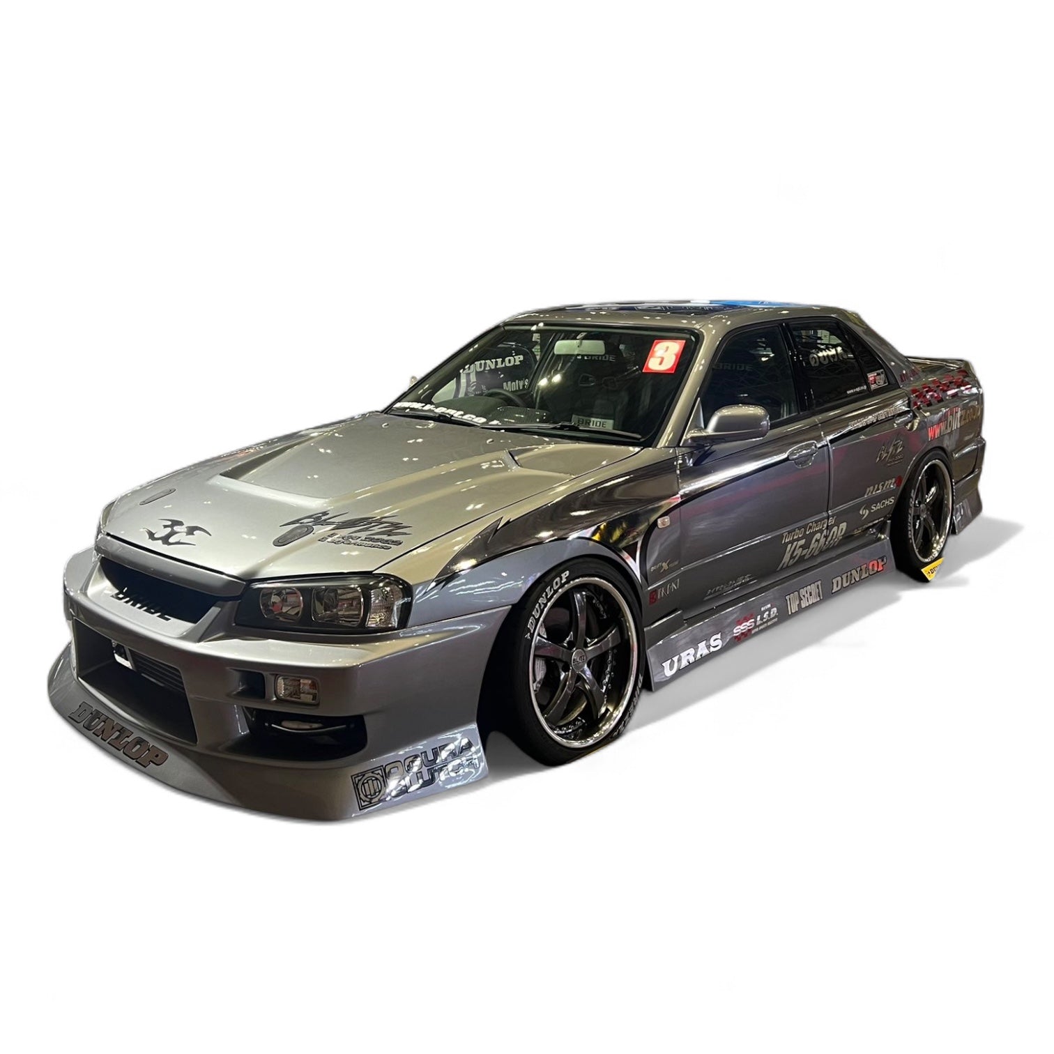 URAS HARIDASHI Front Bumper for R34 SKYLINE 4Dr